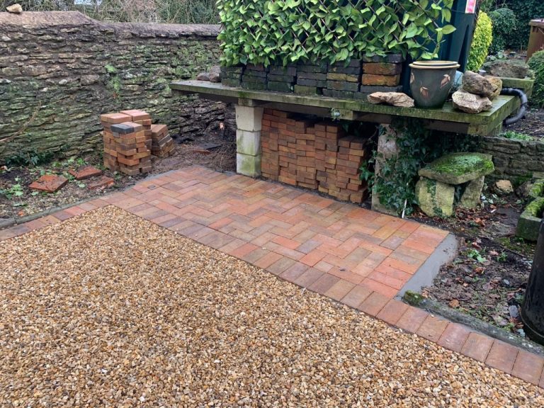 Gravel Driveway with Block Paving Bin Area in Hethe