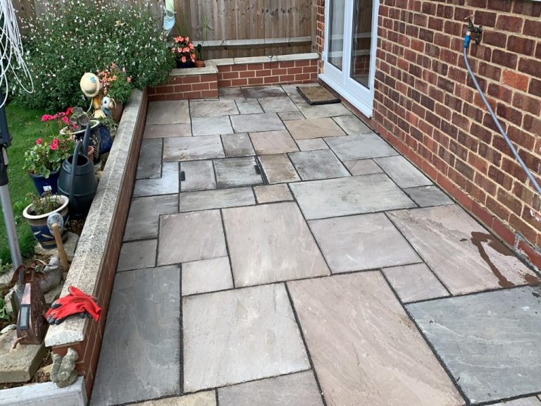 Indian Sandstone Patio with Retaining Wall in Banbury