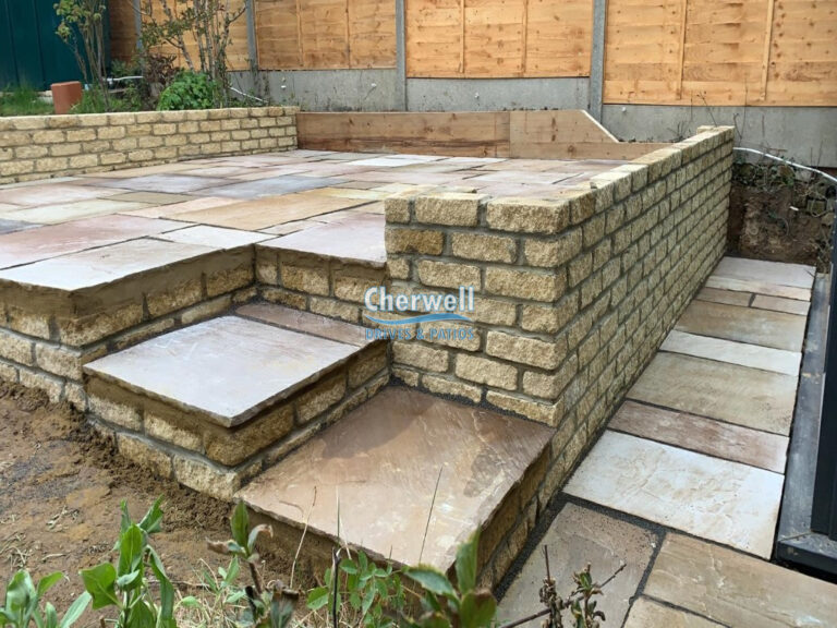 Raised Patio with Retaining Brick Walls in Mollington