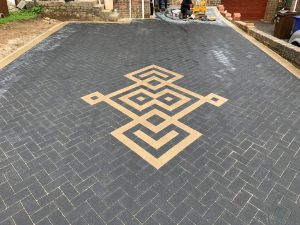 Sloped Block Paving Driveway with Pattern Insert in Banbury